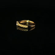 A classic solitaire, elevated in 22K gold
