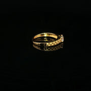 A classic solitaire, elevated in 22K gold