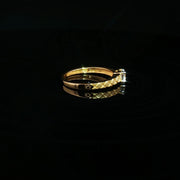 Solitaire brilliance, perfected in 22K gold