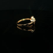 A symbol of luck, crafted in 22k gold